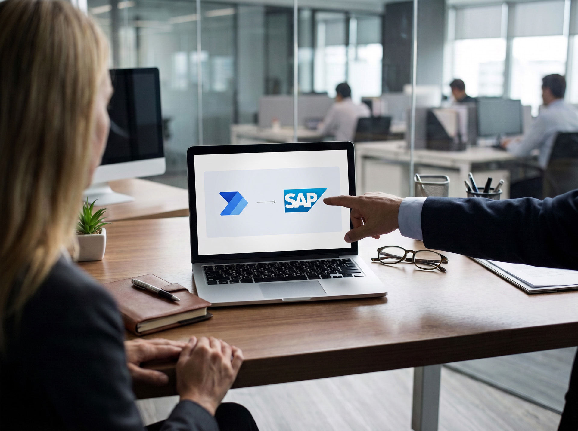 Business meeting about order process automation using Power Automate and SAP